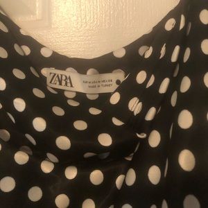 Polka dot slip dress in black and white.